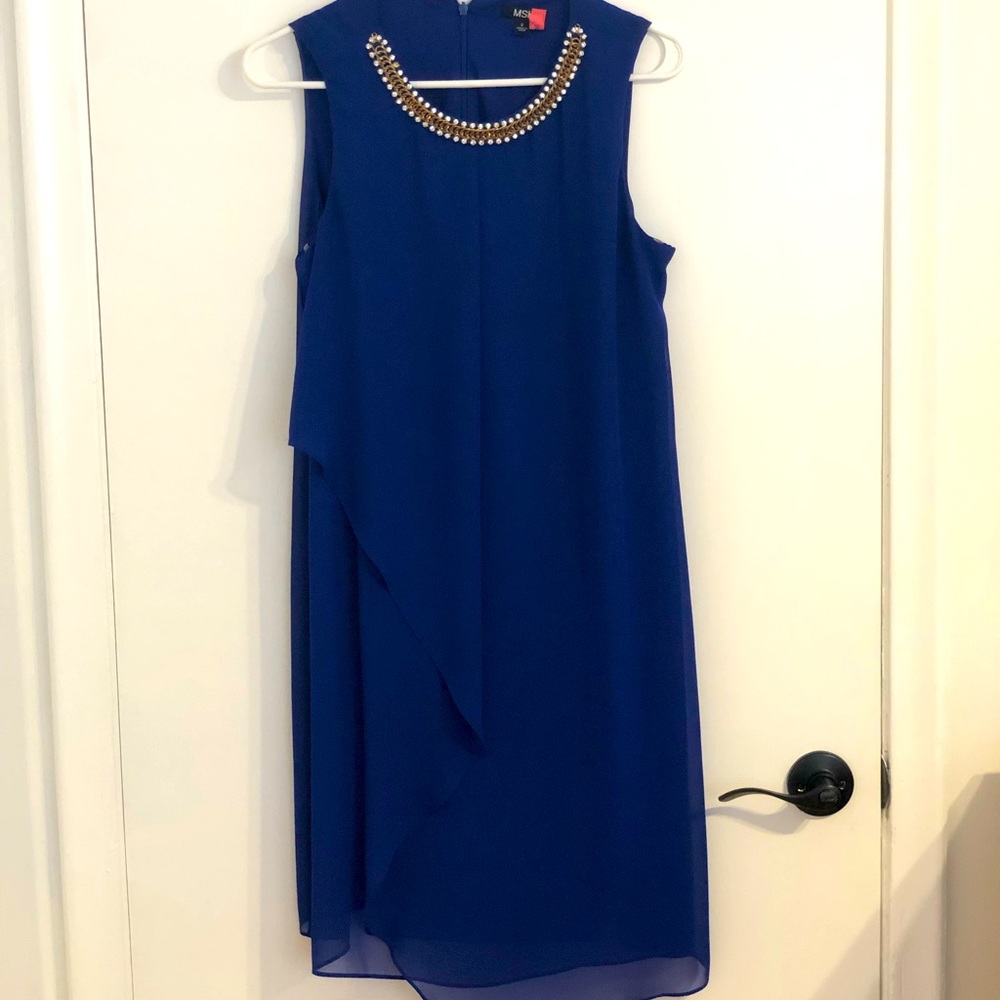 Elegant Navy blue dress. Size 6. In great condition only worn a few times.